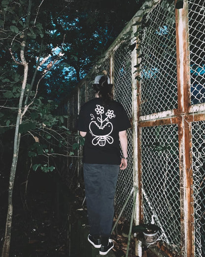 BLOOM FIEND | Black Cotton Tee with Flower-Chomp Doodle
