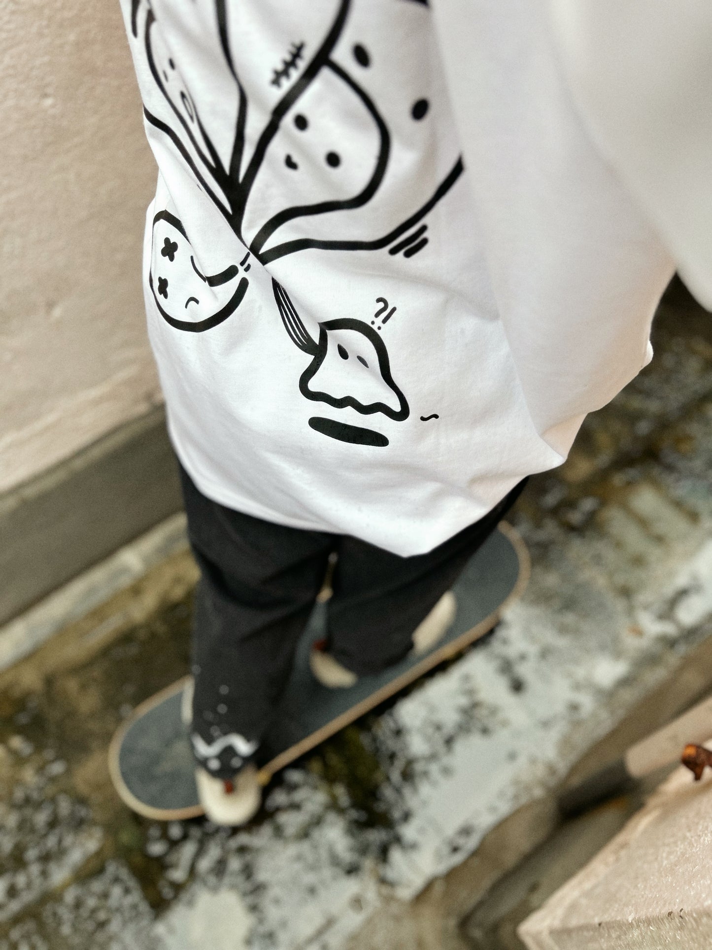 HEAD TRIP | White Cotton Tee with Balloon-Head Doodle